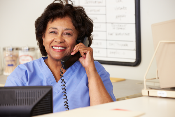 Nurse or receptionist answering phone