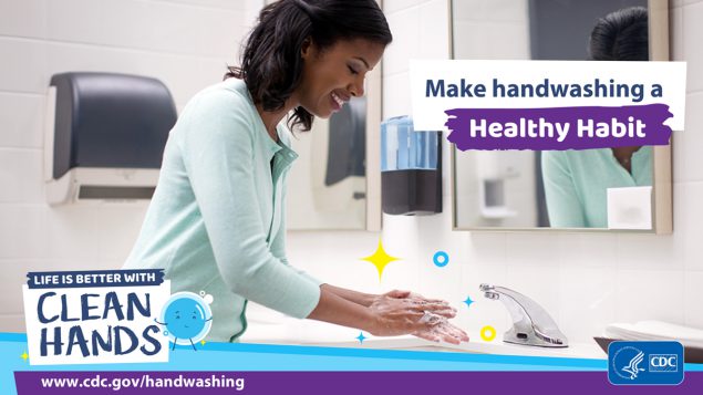 Woman handwashing at a sink