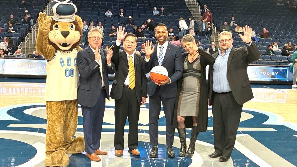 VDH leaders and partners promoting public health awareness at an ODU basketball game
