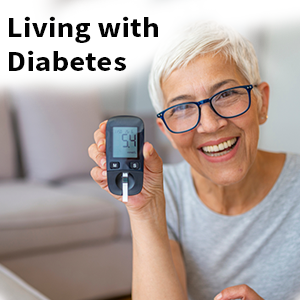 Living with Diabetes- Senior woman smiling holding the Diabetes Testing machine 