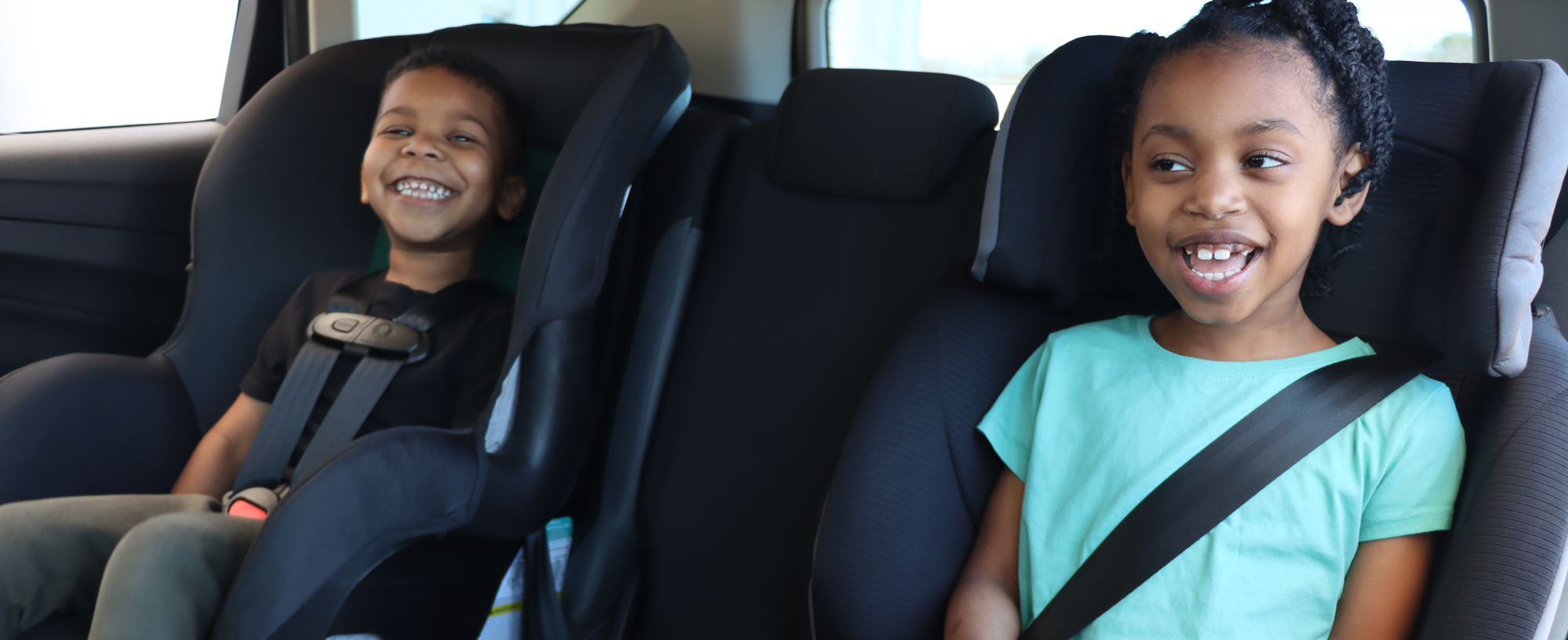 Two children in car seats