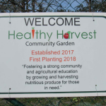 Photo of the Healthy Harvest Community Garden sign
