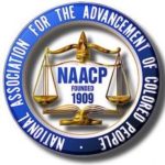 Một vòng tròn màu xanh với cán cân công lý màu vàng.