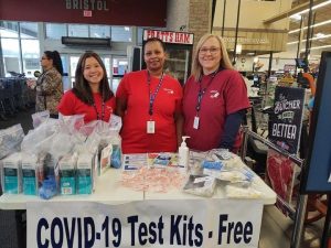 Southwest Virginia Medical Reserve Corps volunteers giving out COVID-19 test kits
